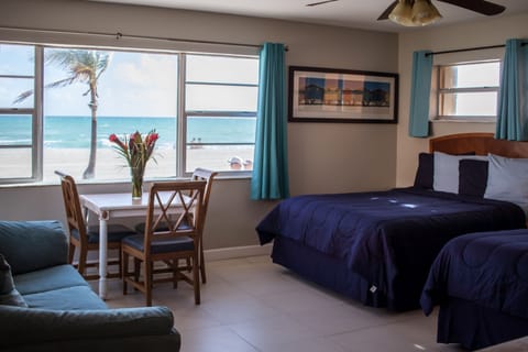 Double Room, Ocean View | In-room safe, desk, iron/ironing board, free cribs/infant beds