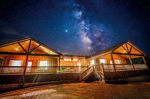 Cabins C + D @ night under the Milky Way! Area voted for the best stargazing! 