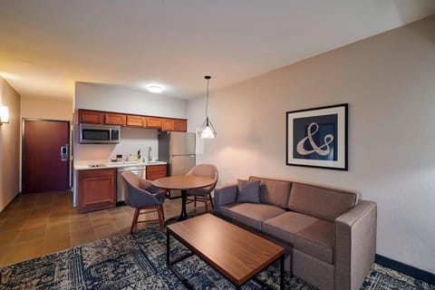 Suite, 1 Bedroom | Desk, iron/ironing board, free cribs/infant beds, rollaway beds