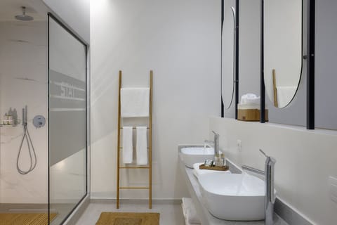 Suite, Garden View | Bathroom | Shower, rainfall showerhead, designer toiletries, hair dryer