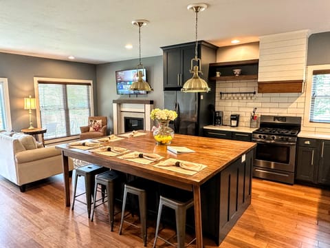 Entry to kitchen and large dining island.