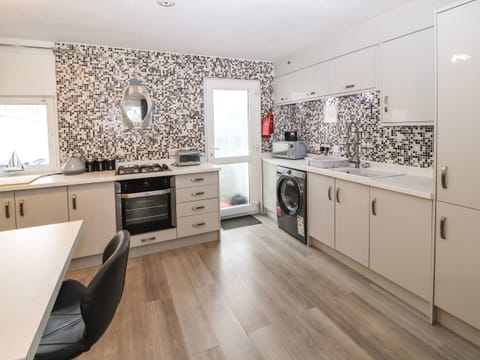 Fridge, electric kettle, toaster, cookware/dishes/utensils