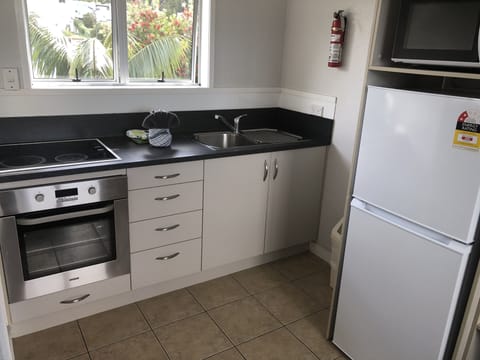 Two Bedroom Holiday Apartment 2 Storey | Private kitchen | Microwave, electric kettle, toaster