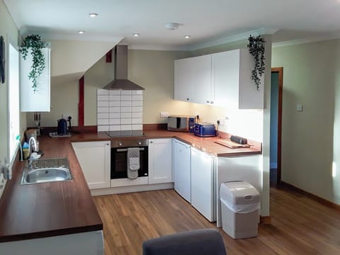 Kitchen | MacRury Cottage, Balemore, near All Outer Hebrides