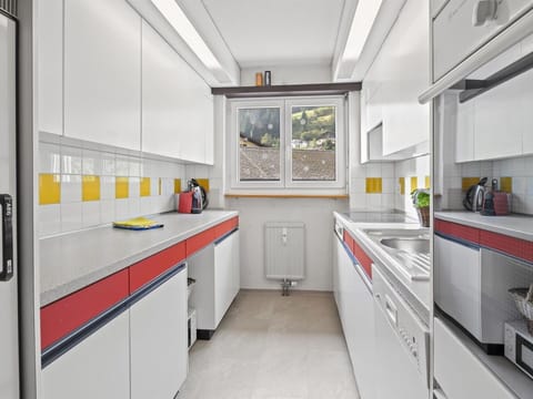 Cabinetry, Building, Countertop, Kitchen, Kitchen Stove, Drawer, Interior Design, Kitchen Appliance, Major Appliance