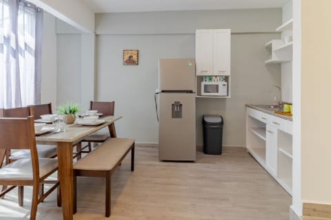 APARTAMENTO III HOME SWEET HOME | Private kitchen | Coffee/tea maker, cleaning supplies, paper towels, dining tables