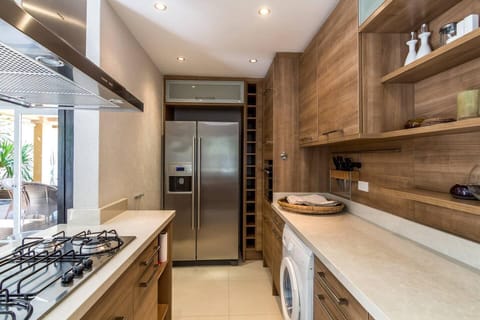 Villa | Private kitchen | Fridge, microwave, oven, stovetop