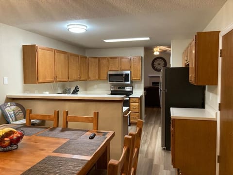 The fully equipped kitchen and diner for 8 people is on the ground level.