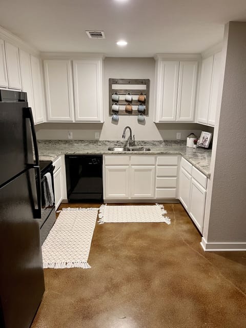 Full kitchen with pots, pans and service for 8.