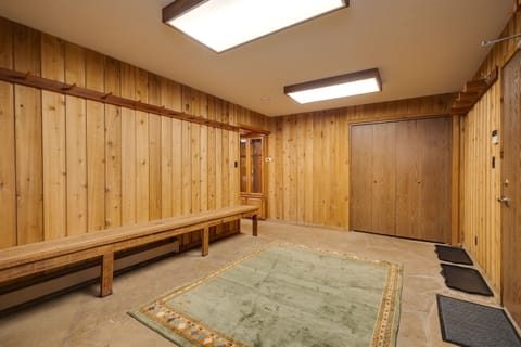 The large mud room with ski storage is the perfect place to store your boots, boards, and skis!