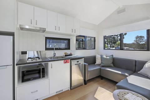 Tiny Home - Sleeps 2 - Dog Friendly | Living area | 32-inch flat-screen TV with digital channels, TV