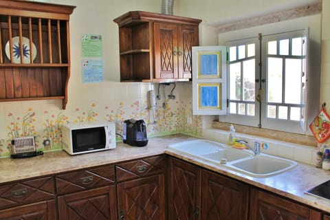 Villa, 1 Bedroom, Courtyard View | Private kitchenette | Fridge, microwave, stovetop, espresso maker