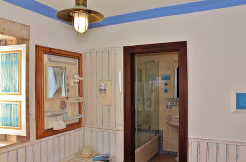 Villa, 1 Bedroom, Courtyard View | Bathroom | Free toiletries, hair dryer, towels, soap