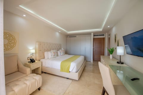 Premium Room, 1 King Bed, Kitchen, Sea View | Minibar, in-room safe, desk, laptop workspace