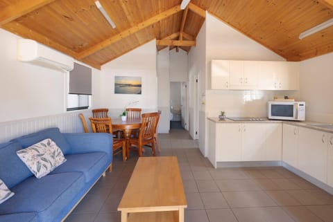 Deluxe Cabin - Sleeps 6 | Living area | LCD TV