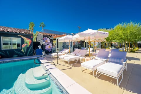 Outdoor pool, free cabanas, pool umbrellas