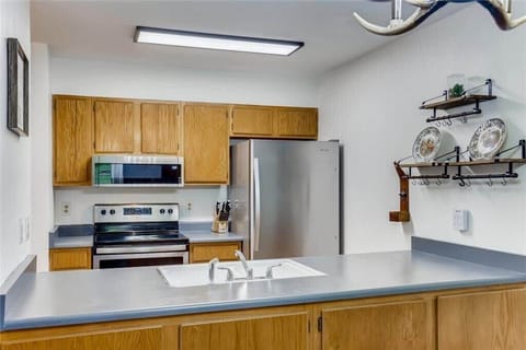 Fully-equipped kitchen with modern stainless steel appliances