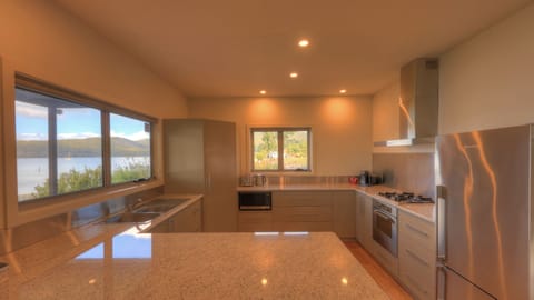 Tides Reach | Private kitchen | Full-size fridge, oven, stovetop, dishwasher