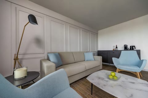 Luxury Suite, Sea View | Living area | LED TV