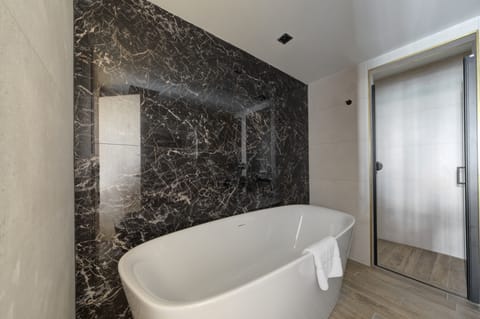 Luxury Suite, Sea View | Bathroom | Designer toiletries, hair dryer, bathrobes, slippers