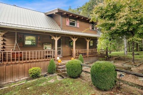 Exterior of our river side cabin home.