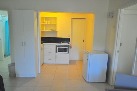 Apartment, 1 Bedroom (for 2) | Private kitchen | Microwave, stovetop, electric kettle, toaster