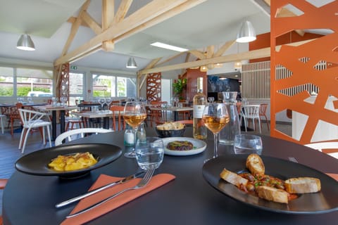 Breakfast, lunch, dinner served; Fusion cuisine, pool views