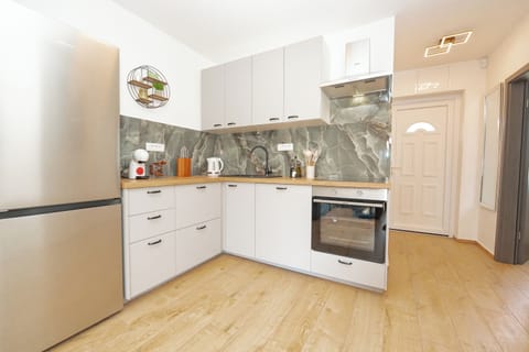 Apartment | Private kitchen | Fridge, oven, stovetop, dishwasher