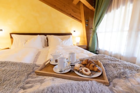 Down comforters, desk, travel crib, bed sheets