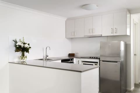 Two Bedroom Superior Apartment | Private kitchen | Full-size fridge, microwave, oven, stovetop