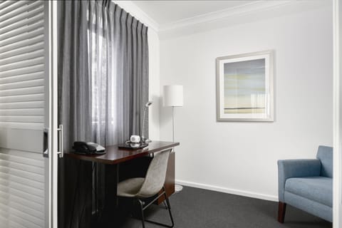 One Bedroom Executive Apartment | Desk, laptop workspace, blackout drapes, iron/ironing board