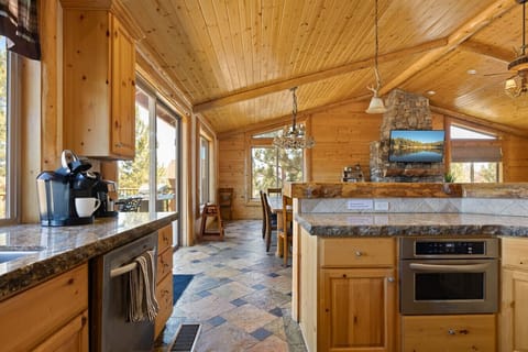 Imagine waking up here to make breakfast! Granite counters and stainless steel appliances.