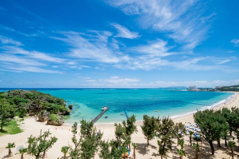 On the beach, sun loungers, beach umbrellas, beach towels