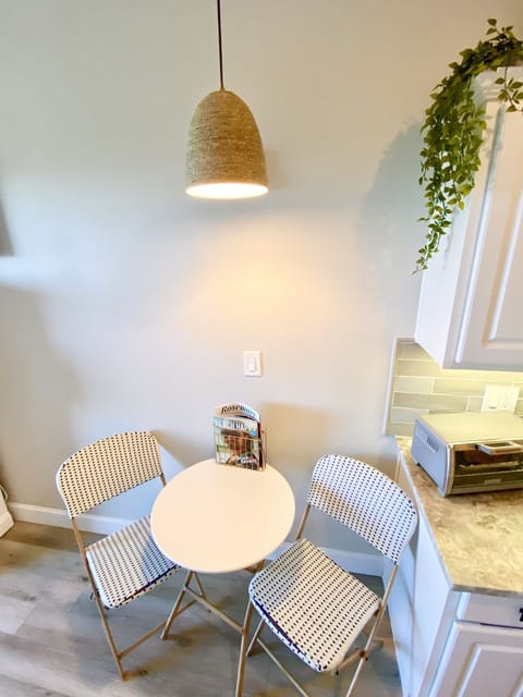 Bistro Table for two. ( or work from your laptop here) 