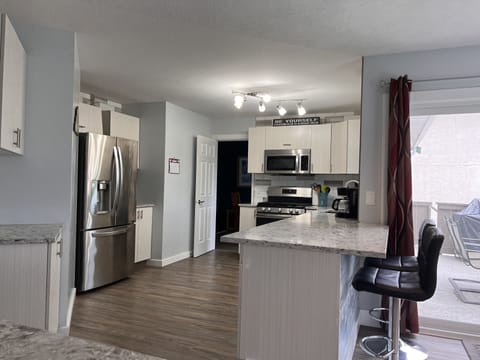 Kitchen from nook and family room