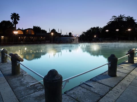 Outdoor pool, open 8:00 AM to 6:00 PM, pool umbrellas, sun loungers