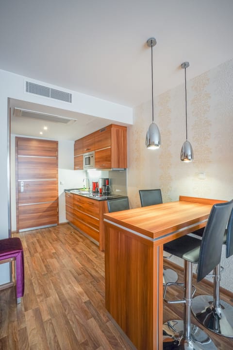 Studio | Private kitchen | Full-size fridge, microwave, stovetop, coffee/tea maker