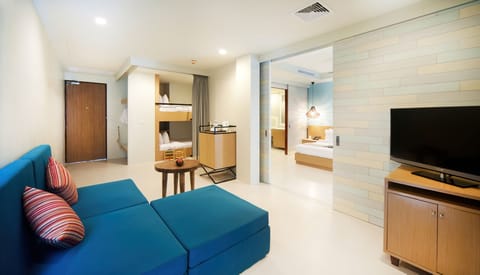 Kids' Suite with Pool View - Free Minibar | Living area | 50-inch TV with satellite channels