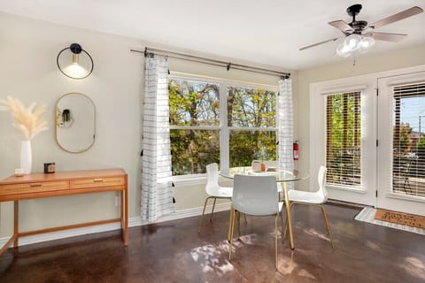 Between the two spaces, find our 4-top dining table.