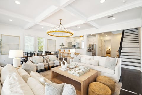 Beautiful living room w/ TV, dining, and kitchen!