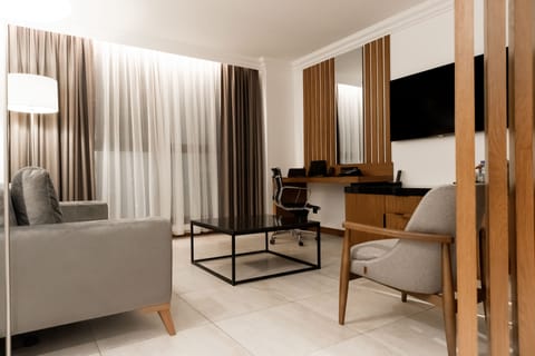 Premium Suite | Living area | LED TV, offices