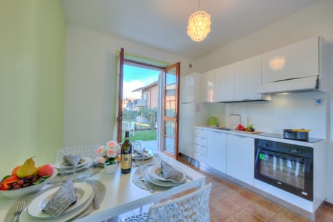 Standard Apartment, 2 Bedrooms (Villa Fiorita - Apt 2 - Margherita) | Private kitchen | Fridge, oven, stovetop, coffee/tea maker