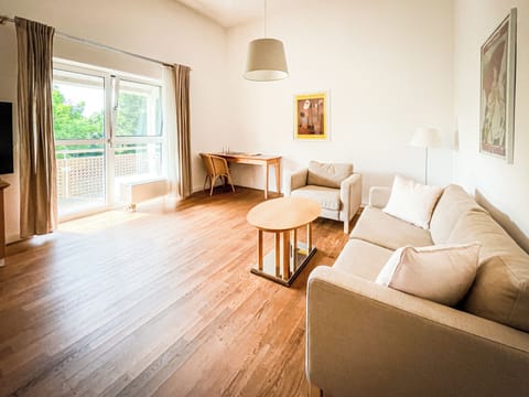 Suite, 2 Bedrooms | Living room | Flat-screen TV