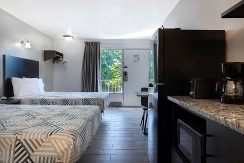 Standard Room, 2 Queen Beds, Non Smoking, Kitchenette | Iron/ironing board, free WiFi, bed sheets