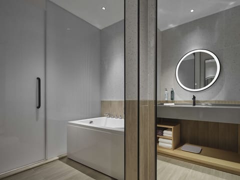 Premium Suite, 1 King Bed | Bathroom | Shower, rainfall showerhead, free toiletries, hair dryer