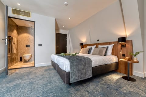 Family Triple Room | In-room safe, desk, laptop workspace, blackout drapes