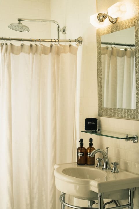 Design Room | Bathroom | Rainfall showerhead, hair dryer, heated floors, towels