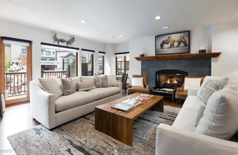 Updated living room overlooking the ice rink in Beaver Creek Village! 