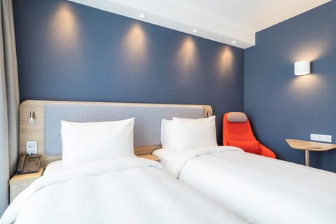 Desk, soundproofing, iron/ironing board, free cribs/infant beds