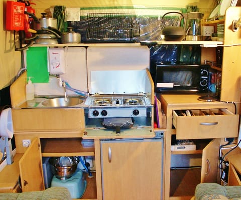 VERY fully equipped kitchen! Hot water, microwave, fridge. Lots of storage space